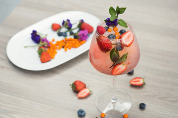 Cocktail with champagne against light background