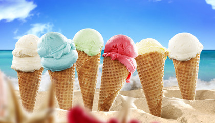 Summer photo of icecream and beach background 