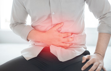 Man with abdominal pain. Abodominal disease concept.