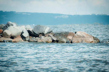 Stone Cape on water