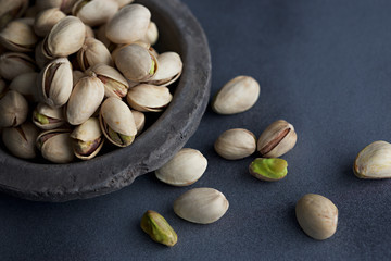 Bowl of Green Shelled Pistachio Nuts
