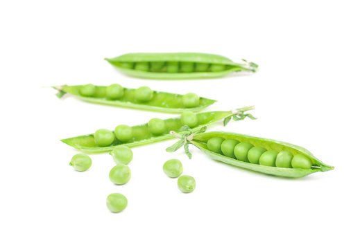 green peas isolated on white background