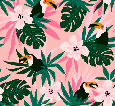 Floral background with tropical flowers, leaves and toucans. Vector seamless pattern for stylish fabric design.