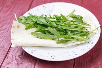 Rocket salad in pita bread.