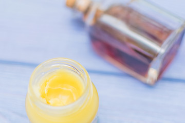 A jar with balm, cream.