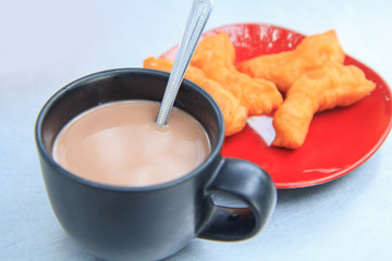 Hot coco with deep-fried doughstick 