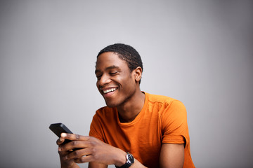 cool african american guy using cellphone