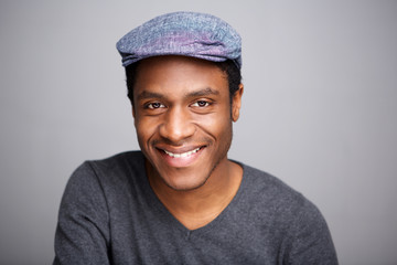 Close up  smiling african american man with cap