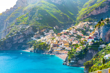 Morning view of Positano cityscape on coast line of mediterranean sea, Italy