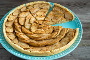 Gourmet traditional holiday apple tart. Rustic style and natural light.