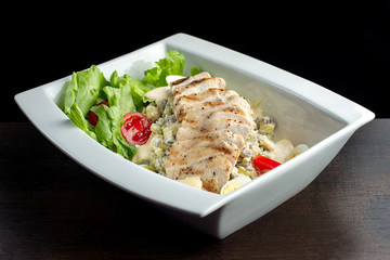 Fresh salad with chicken breast.