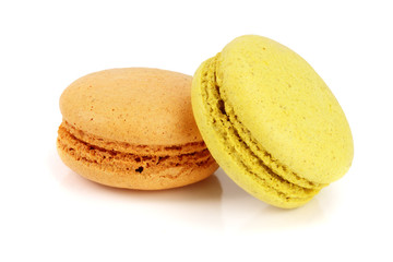 orange and yellow macaroon isolated on white background closeup