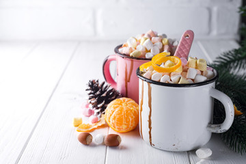 two cups with hot chocolate or cocoa with marshmallow