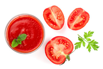 Tomato juice in glass and tomatoes with parsley leaves isolated on white background. Top view. Flat lay