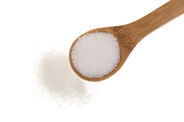 granulated sugar in wooden spoon isolated on white background. Top view. Flat lay