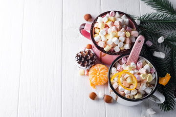 two cups with hot chocolate or cocoa with marshmallow