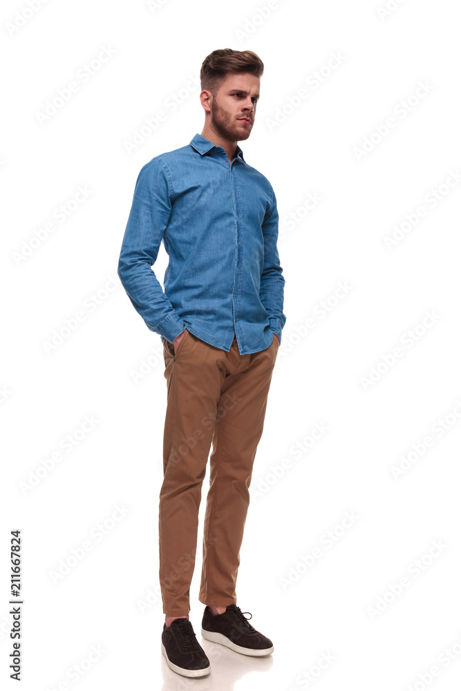 Canvas Prints serious casual man standing looks to side