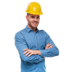 portrait of confident young engineering student with helmet