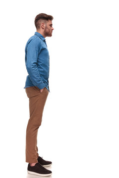 relaxed young casual man waiting in line