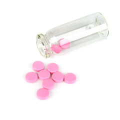 Medical preparations, pills in a glass bottle isolated on white background. Free space for text.