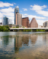 Fototapeta na wymiar The Colorado River Flows By Parks and Buildings in Austin Texas