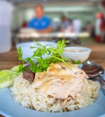 Hainanese chicken rice , Thai gourmet steamed chicken with rice, bean sauce and soup.