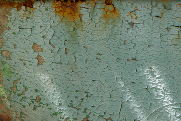 Old paint texture on a rusty iron sheet