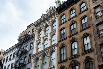 Fototapeta na wymiar New York City / USA - JUN 20 2018: Old buildings in the TriBeCa of Lower Manhattan in New York City