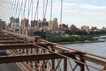 New York City / USA - JUN 20 2018: Brooklyn Bridge with buildings at early morning in New York City