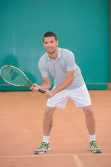 tennis player preparing to play
