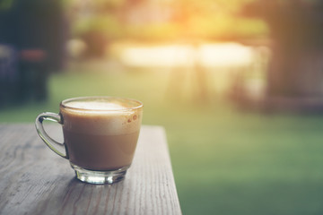 Coffee cup in coffee shop - vintage style effect picture