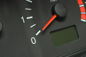 the instrument panel in the car, the speed dial on the dashboard