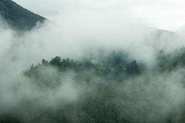 house in the fog on the mountain