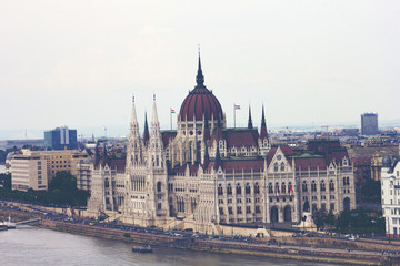 Fototapeta premium Budapest, Hungary - June 2018, The Hungarian Parliament Building, the Orszaghaz, and the River Danube in Budapest, Hungary, 29 June 2018