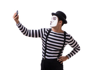 Mime with smartphone isolated on white background