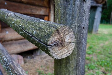 Fototapeta premium Wooden fence beam with cracks 