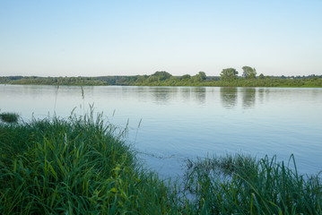 Obraz premium Morning on a river with fog, fishing