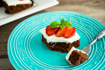 brownies with strawberry on a plate