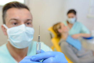 Man preparing syringe