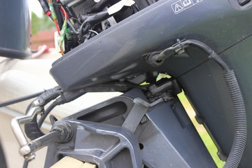 Maintenance and repair of ships - installation of the outboard motor on the transom of the boat,...