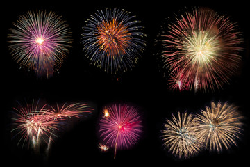 Naklejka premium Abstract beautiful colorful fireworks display for celebration on black background with free space for text. New year holiday concept.