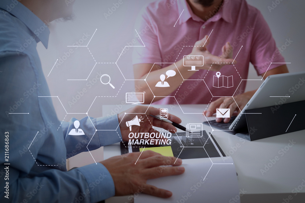 Poster Businessmen working together on a document and using smart phone and digital tablet and laptop computer in modern office