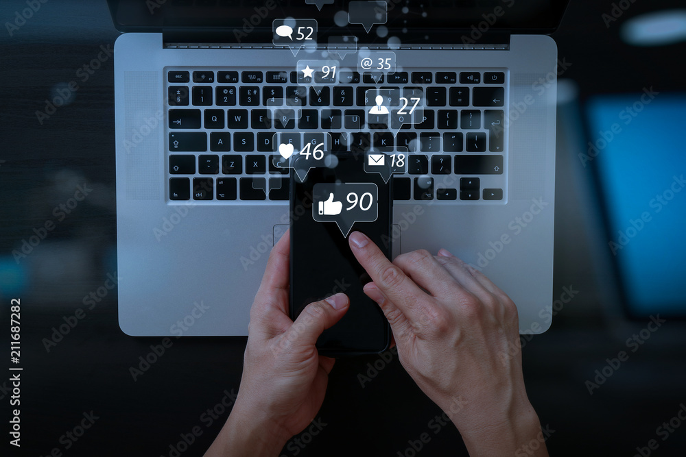 Poster cyber security internet and networking concept.businessman hand working mobile phone on laptop compu