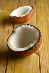 Fototapeta na wymiar open coconut on wooden table