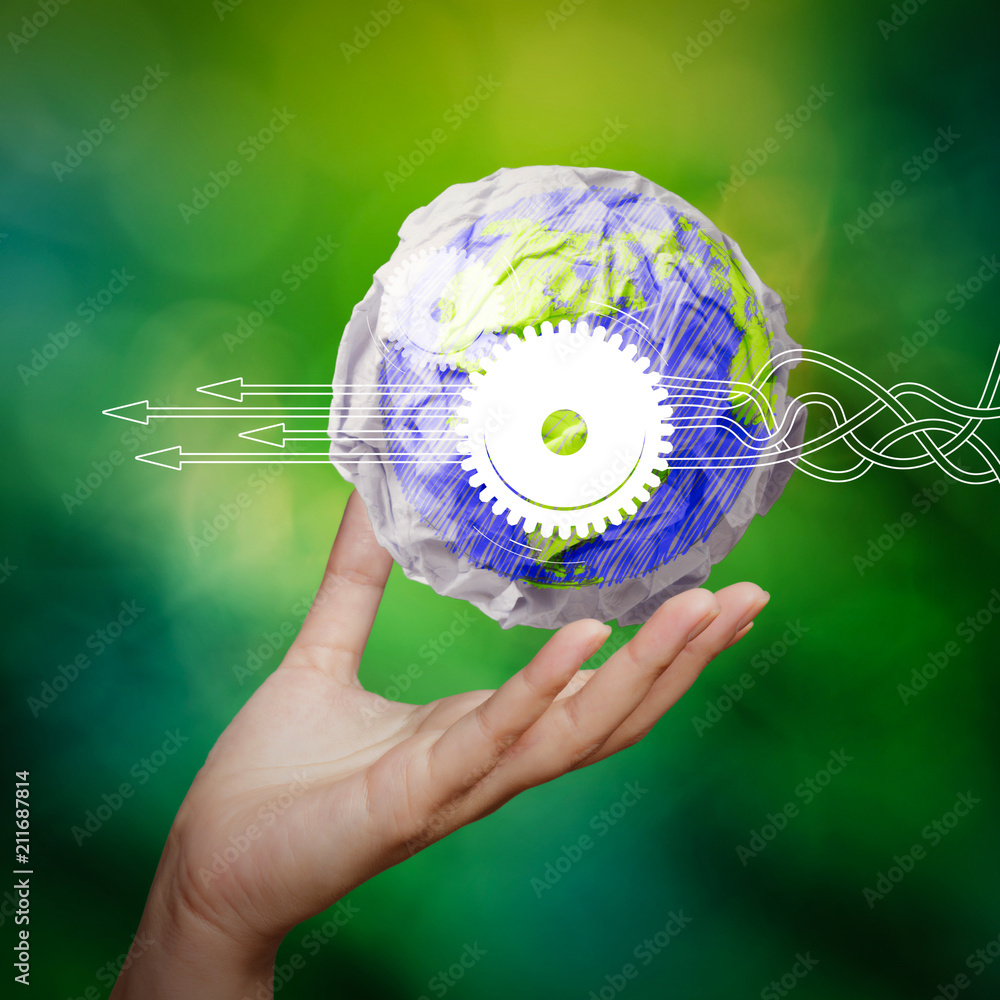 Poster hand showing crumpled world paper symbol as concept