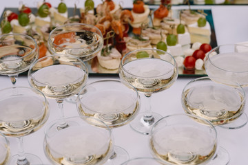 Glasses with champagne on a holiday table