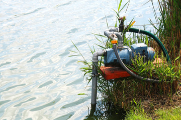 Obraz premium Water pump working in the lake
