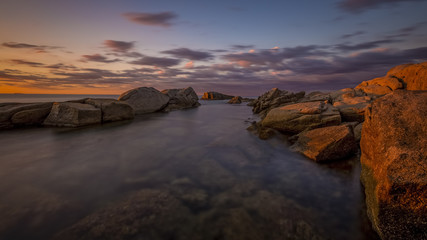 Fototapeta na wymiar Beautiful sunrise in a bay in Costa Brava, Spain