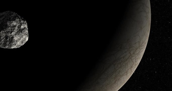 An asteroid tumbles slowly in space as it passes Europa. Reversible, can be rotated 180 degrees. Elements of this image furnished by NASA.