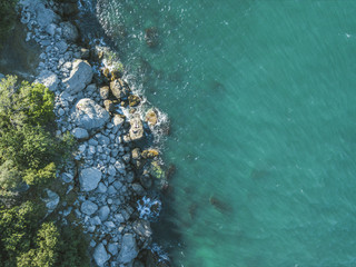 aerial sea and sone rock coast copy space summer sunny day